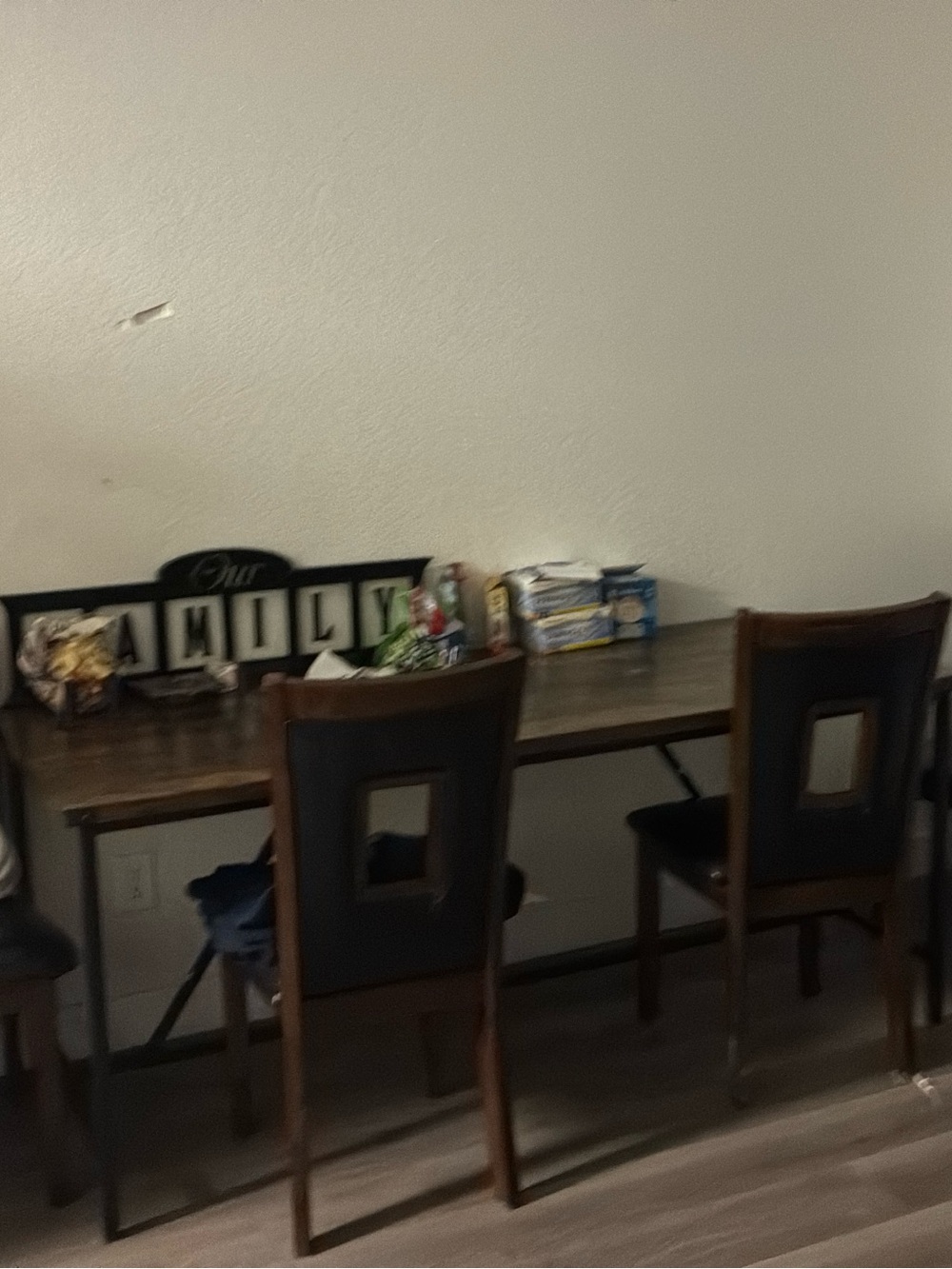 Wood Dining Table with Dark Brown Chairs